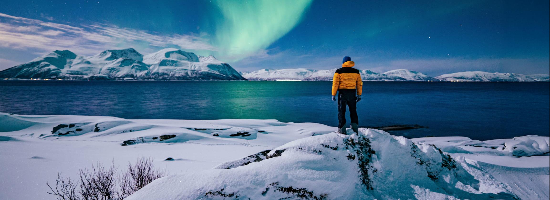 Polarlicht Mensch am Meer